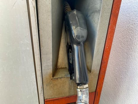 Gasoline and diesel distributor at the gas station. Gas pump nozzles. Petrol filling gun close-up at the gas station. Colorful Petrol pump filling nozzles. Fuel pump photo