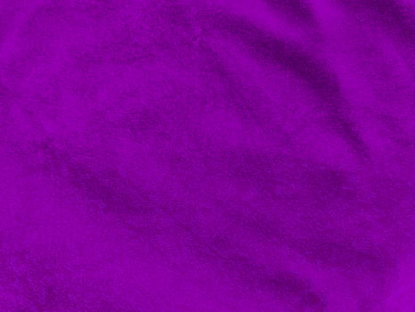 Purple velvet fabric texture used as background. Empty purple fabric background of soft and smooth textile material. There is space for text. photo