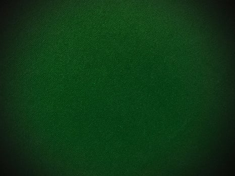 Dark green old velvet fabric texture used as background. Empty green fabric background of soft and smooth textile material. There is space for text.. photo