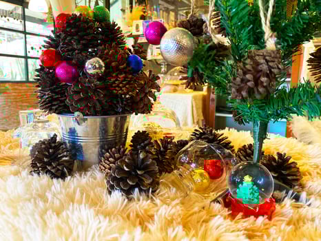 Christmas and New Year background consisting of pine trees, snowmen, gift boxes, used for graphics, designs, with space for text. photo