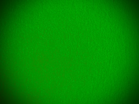 Felt green soft rough textile material background texture close up,poker table,tennis ball,table cloth. Empty green fabric background. photo