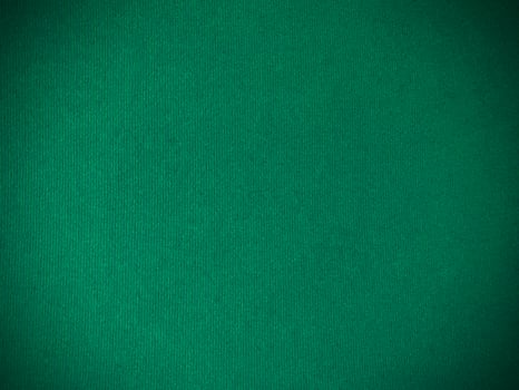 Dark green old velvet fabric texture used as background. Empty green fabric background of soft and smooth textile material. There is space for text.. photo