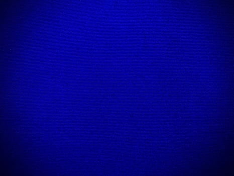 Dark blue velvet fabric texture used as background. Empty dark blue fabric background of soft and smooth textile material. There is space for text. photo