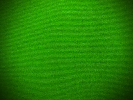 Green velvet fabric texture used as background. Empty green fabric background of soft and smooth textile material. There is space for text. photo