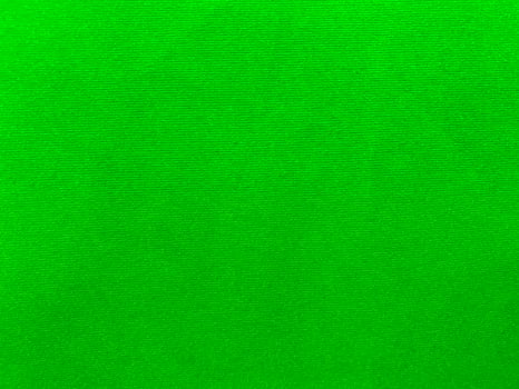 green velvet fabric texture used as background. Empty green fabric background of soft and smooth textile material. There is space for text. photo