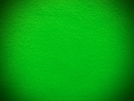 Felt green soft rough textile material background texture close up,poker table,tennis ball,table cloth. Empty green fabric background. photo