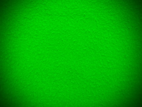 Felt green soft rough textile material background texture close up,poker table,tennis ball,table cloth. Empty green fabric background. photo