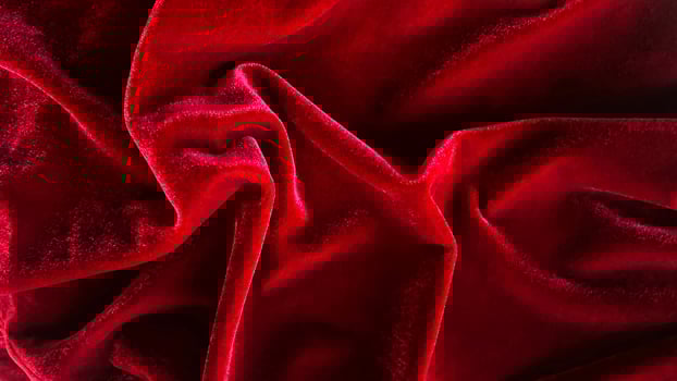 Red velvet fabric texture used as background. Empty Red fabric background of soft and smooth textile material. There is space for text. photo