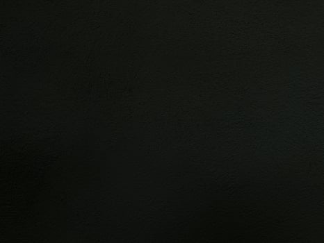 Seamless texture of black cement wall a rough surface, with space for text, for a background. photo