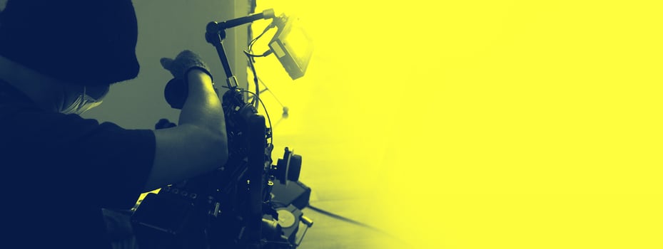 Behind the scenes of Videographer or photographer shooting video or movie production photo