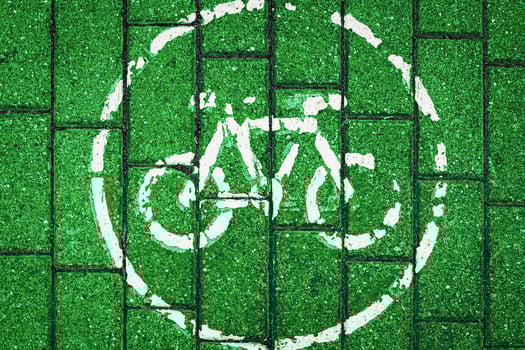 Road sing - path for bicycles on the road pavement photo