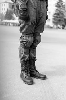 Armed soldier ready for battle. Military concept. photo