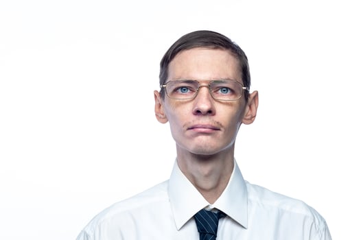 Business man in tie and glasses, on a white, isolated background photo