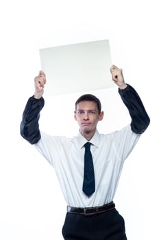 Business man with a piece of paper in his hands on a white, isolated background photo