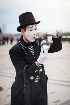 Mime on the street waiting to meet with his lover photo