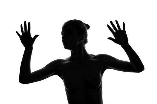 silhouette of a dancing girl on an isolated background photo