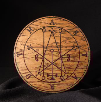 Ouija Board, yellow on a black background photo