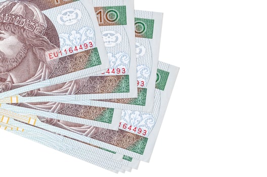 10 Polish zloty bills lies in small bunch or pack isolated on white. Mockup with copy space. Business and currency exchange photo