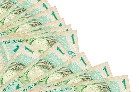 1 Brazilian real bills lies isolated on white background with copy space stacked in fan close up photo