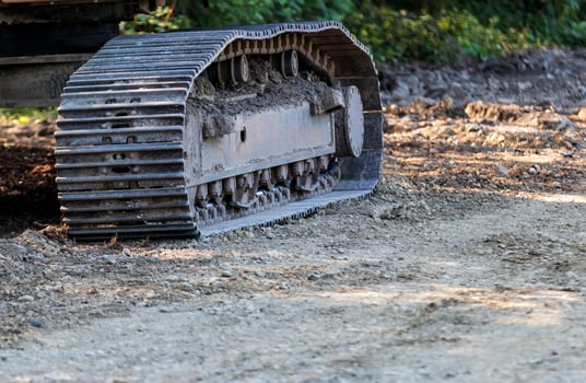 Industrial implement steel metal wheel tracks photo