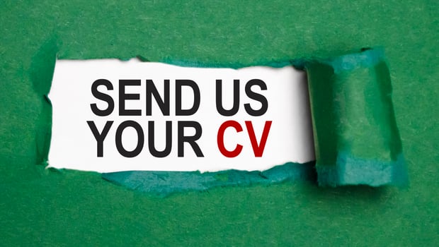 send us your cv on torn paper with green paper photo