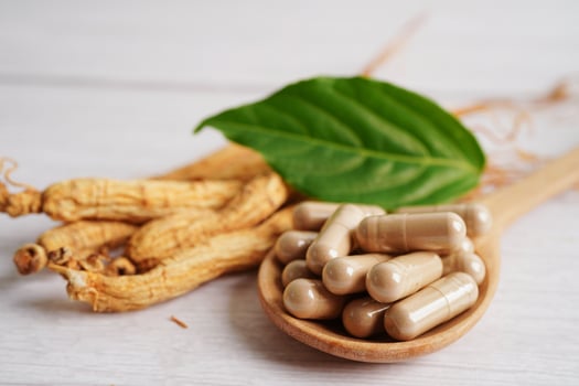 Ginseng roots and green leaf, healthy food. photo