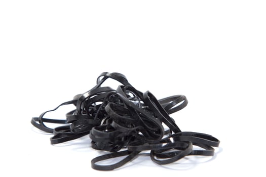 Black rubber band on a white background photo