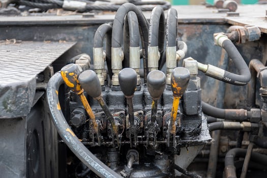 Hydraulic control levers on construction machinery. Crane control lever panel. photo