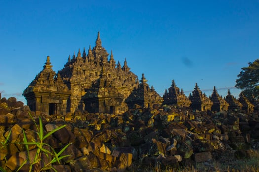 Candi Plaosan, a Buddhist temple located in Klaten Central Java, Indonesia, with a background of Mount Merapi photo