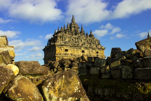 Candi Plaosan, a Buddhist temple located in Klaten Central Java, Indonesia, with a background of Mount Merapi photo