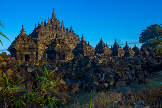 Candi Plaosan, a Buddhist temple located in Klaten Central Java, Indonesia, with a background of Mount Merapi photo