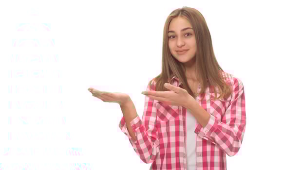 young beautiful woman in gray shirt , holding imaginary object on the palm. isolated on white photo