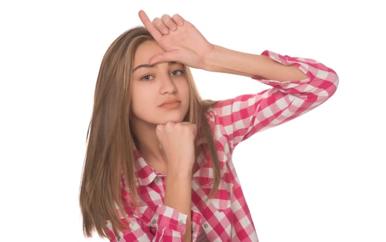 young woman looking amazed posing isolated on white background photo