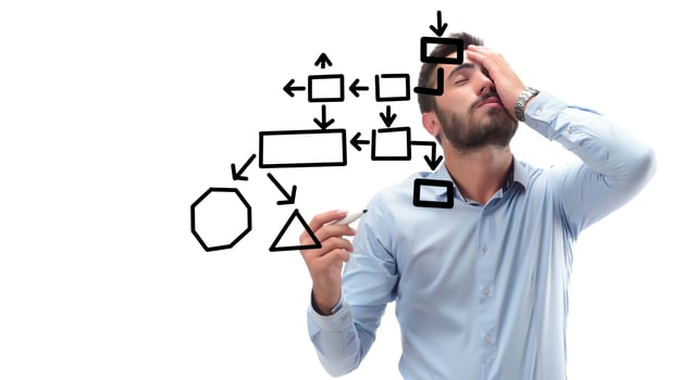 Portrait of a smiling businessman writing Business Plan on the screen photo