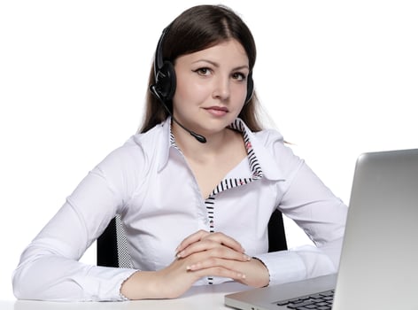 beautiful female model working on a laptop photo