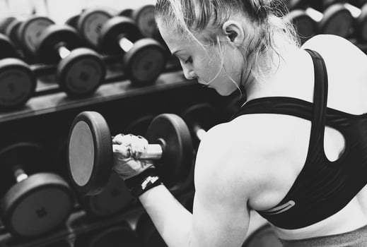 Woman doing a workout at the fitness gym. photo