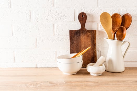 kitchen background for the layout with a copy of the space on a white brick wall. minimalist composition of part of the kitchen countertop. photo