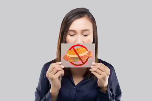 Asian women abstaining from fast food and junk food photo