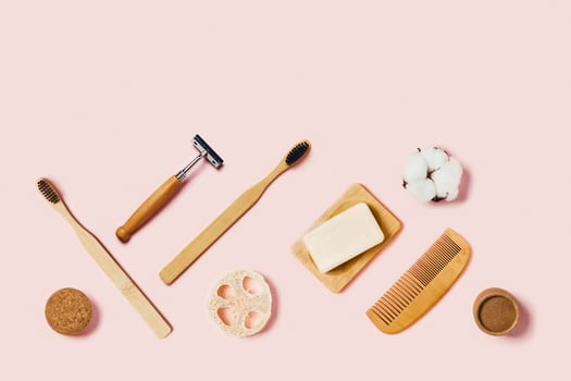 Zero waste accessories on pink background. photo
