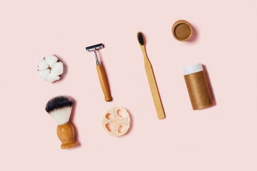 Zero waste accessories on pink background. photo