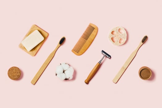 Zero waste accessories on pink background. photo