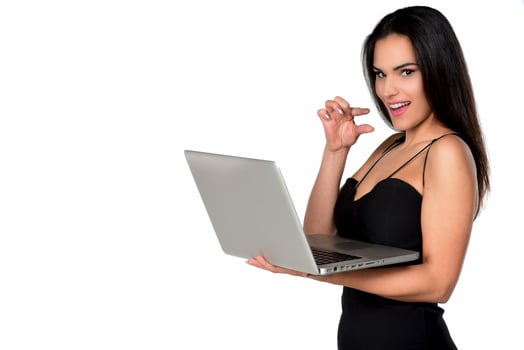 beautiful smiling woman holding laptop computer photo