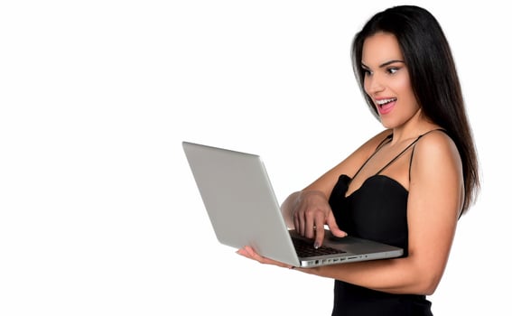 beautiful smiling woman holding laptop computer photo