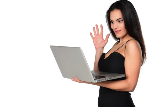 beautiful smiling woman holding laptop computer photo