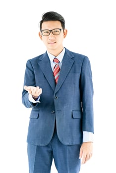 Businessman portrait in suit and wear glasses photo