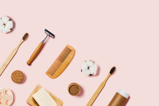 Zero waste accessories on pink background. photo