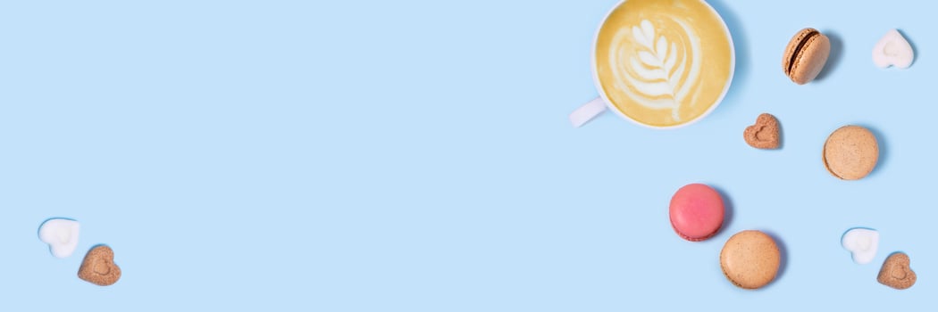 Greeting card with coffee and macaroons. photo