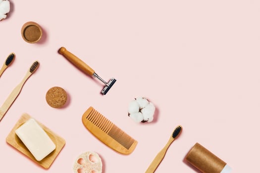 Zero waste accessories on pink background. photo