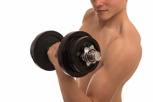 male holding  dumbbells isolated on white background photo