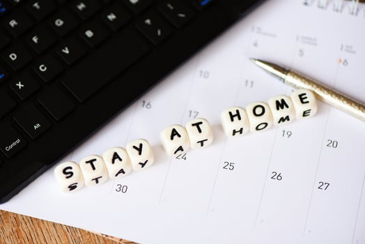 work from home words stay at home with keyboard on calendar - pandemic of coronavirus or Covid-19 and social distancing staying at home with self quarantine to stop outbreak and protect virus spread photo